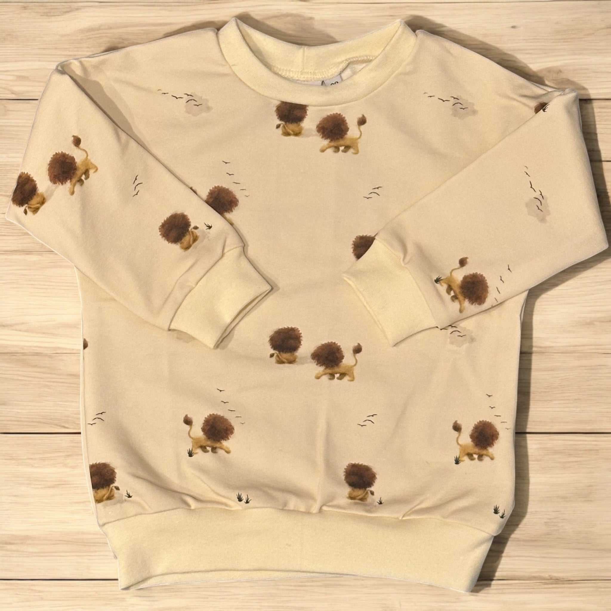 Kinderpullover mit Löwen