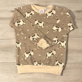 Kinderpullover mit Kühen drauf.